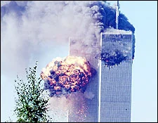 A fireball erupts from the South Tower of the World Trade Center at 9:03 a.m. on September 11, 2001, with the North Tower burning behind it